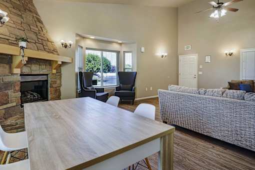 A living room with a fireplace and a couch.