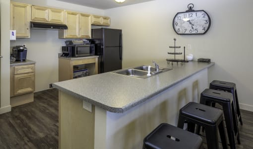 this is a photo of the kitchen in a 750 square foot 2 bedroom, 1 bath apartment