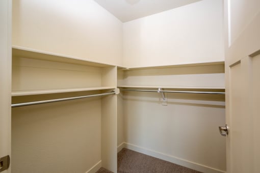 a walk in closet in a 555 waverly unit