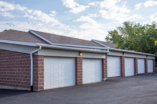 A row of garage doors are closed.