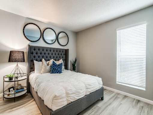 Spacious bedroom with natural light at The Melville Apartments