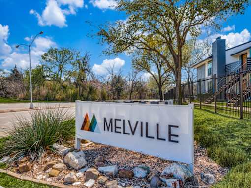 Entrance monument sign at The Melville Apartments in Lake Highlands, Dallas
