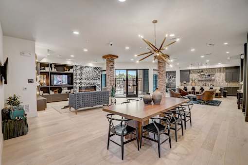 Open concept living dining and kitchen area at The Mill Old Town Apartments, Texas