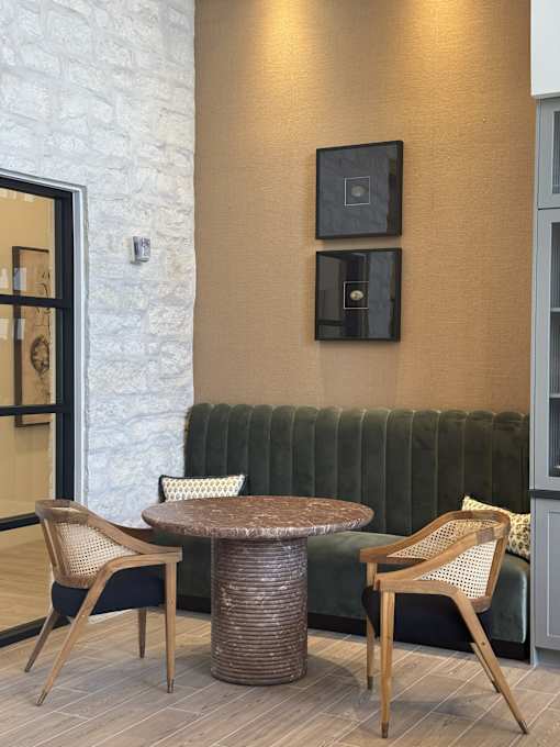 Modern resident clubhouse with inviting seating and gathering spaces.