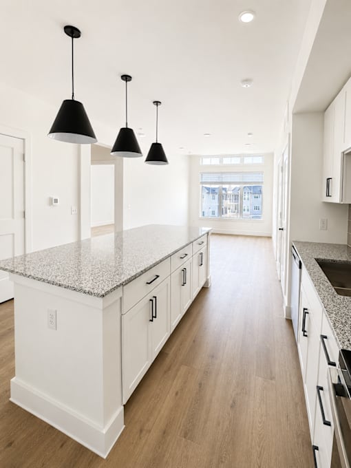 Bright apartment homes with oversized kitchen islands and open-concept living.