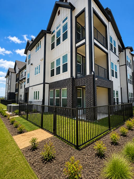 Luxury apartments with fenced yard at The Bluewood