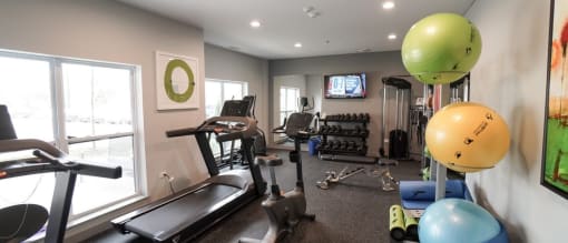 Fully Equipped Fitness center treadmill at Panton Mill Station Apartments,J Street Property Services, LLC, South Elgin, IL, 60177