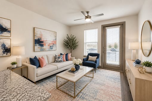 Modern apartment living room with comfortable seating, large windows, and contemporary finishes at One Preston Station Apartments in Celina, Texas.