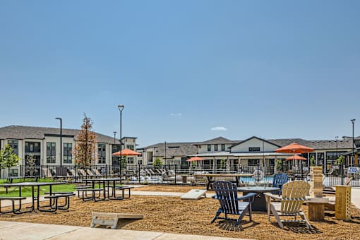 Outdoor recreation area with seating and pool at The Westerly Apartments, Midlothian, TX