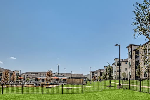 Community courtyard with green space and apartments at The Westerly Apartments, Midlothian, Texas