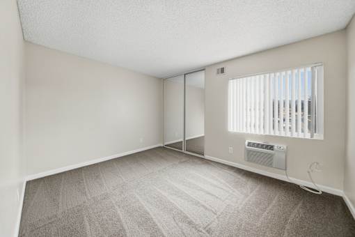 A Guest Bedroom at Midway Gardens Apartments