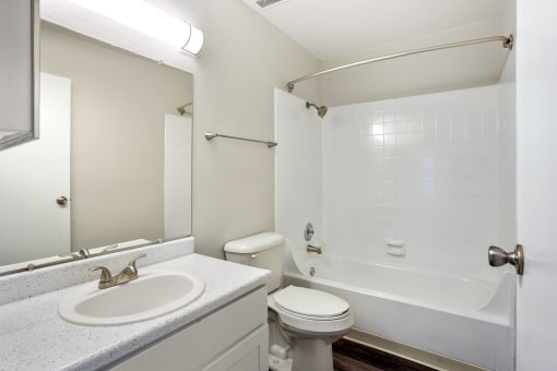 Bathroom With Bathtub at Hilltop View Apartments