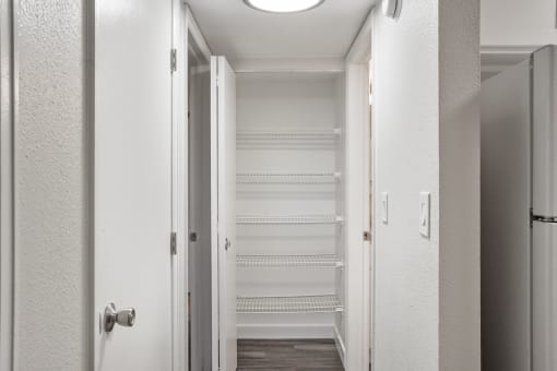 A linen closet at Horizon East Apartments