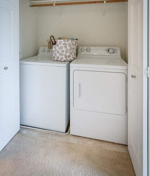 A laundry room with a washer and dryer.