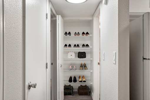 A linen closet at Horizon East Apartments