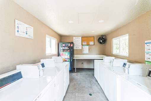 1 of 4 Community Laundry Rooms at Meadow Creek Apartments in San Marcos, CA