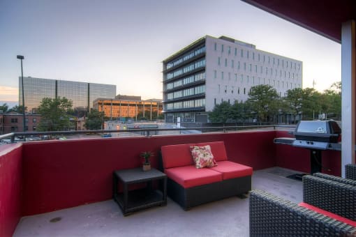 Our Apartment Common Area Patio with BBQ Grill at Sleek Lofts Apartments