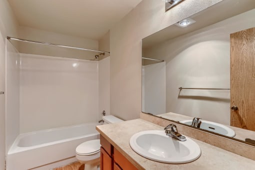A Non-Renovated Bathroom at Ladera Apartments