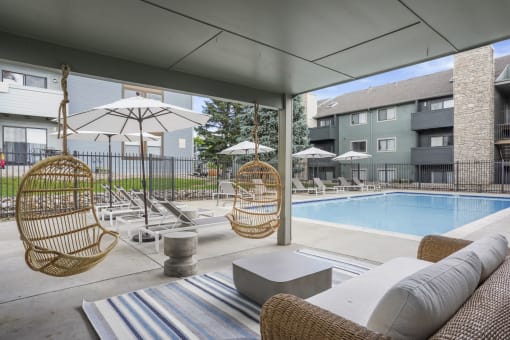 The Community Pool and Lounge Area at Hilltop View Apartments