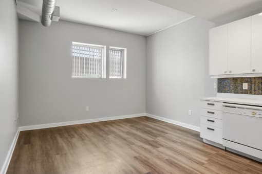 Kitchen and Dining Room at Sleek Lofts