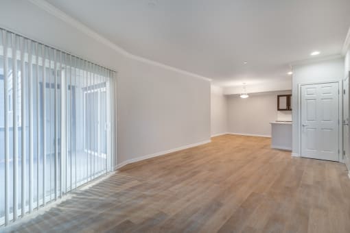Large entry way with access to the patio. Allowing plenty of natural light to grace your future unit