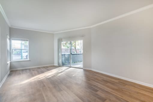 Large entry way with access to the patio. Allowing plenty of natural light to grace your future unit
