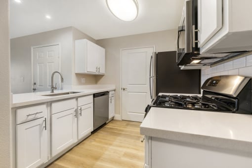 With ample counter space and stylish cabinetry, this kitchen is not only a chef's dream but also a warm, welcoming hub for your home.
