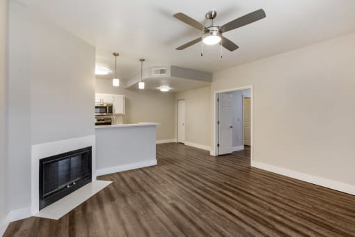 Experience cozy comfort in our lounge featuring a welcoming fireplace at Boulders at Lookout Mountain Apartment Homes, Phoenix