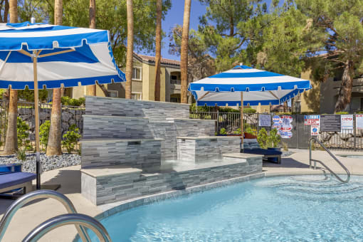 The centerpiece of the deck is an elegantly updated waterfall, adding a touch of tranquility with its soothing sounds.