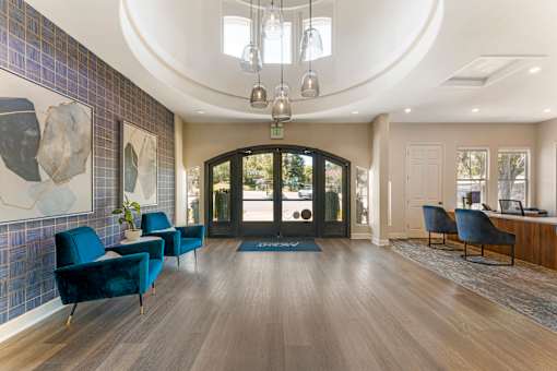 The entrance to the leasing office and clubhouse is warm and welcoming, designed to make all residents and guests feel at home the moment they arrive at Ascent at the Galleria.