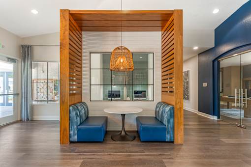 The clubhouse includes a cozy sitting area where neighbors and friends can gather to relax and enjoy each other’s company at Ascent at the Galleria.
