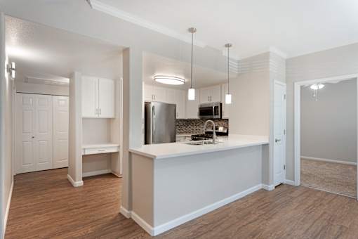 Our renovated units feature an open floor concept, creating spacious, modern living spaces designed for comfort and style at Ascent at the Galleria.