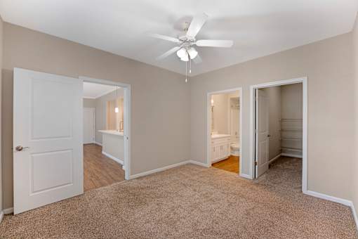 The primary bedrooms feature spacious walk-in closets and private bathrooms, offering comfort and convenience at Ascent at the Galleria.