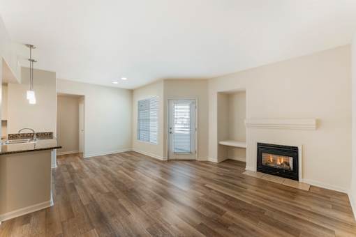 Some units feature cozy firepits and beautiful laminate wood floors, adding warmth and style to your modern living space at Ascent at the Galleria.