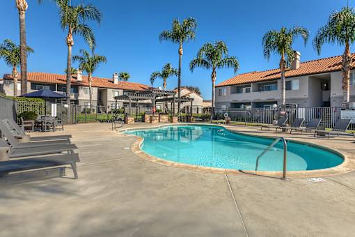 Sedona Apartments in Moreno Valley feature modern living with a newly renovated pool deck, perfect for relaxing and enjoying the California sunshine.