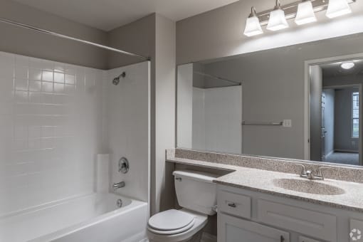 The bathroom features freshly painted walls and new fixtures, offering a pristine, move-in-ready space for you to call home.at The Hills at Quail Run, Riverside, CA, 92507