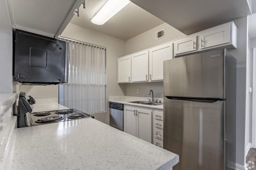 Our units at The Hills at Quail Run feature spacious, freshly renovated kitchens equipped with stainless steel appliances.at The Hills at Quail Run, CA, 92507