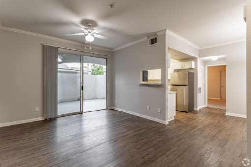 This unit features a ceiling fan in the dining room, elegant hardwood floors in the entrance and kitchen, and comes equipped with energy-efficient appliances.at The Hills at Quail Run, Riverside, CA, 