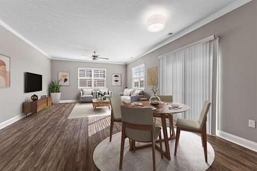 A modern dining room with a wooden table and chairs.