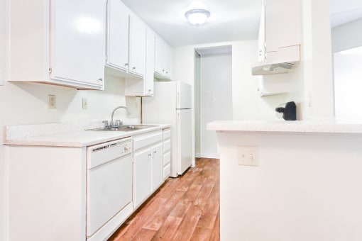 Village Park Apartments Kitchen with White Appliances For Rent