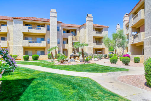 Rolling green grounds of Ventana Apartment Homes in Central Scottsdale, AZ, For Rent. Now leasing 1 and 2 bedroom apartments.