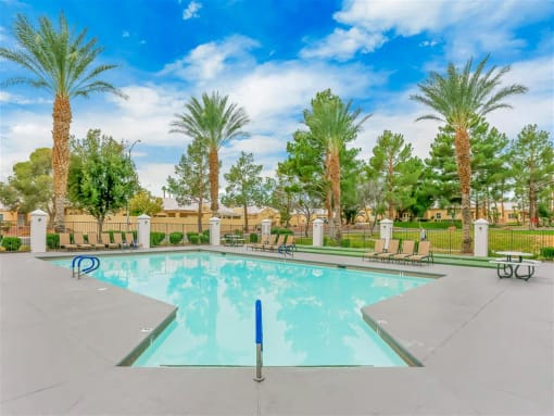 Heated swimming pool at Country Club at The Meadows Senior Apartments in Las Vegas, NV, For Rent. Now leasing 1 and 2 bedroom apartments.
