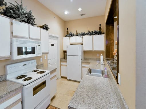 Spacious kitchen storage of Montfort Place in North Dallas, TX, For Rent. Now leasing 1 and 2 bedroom apartments.