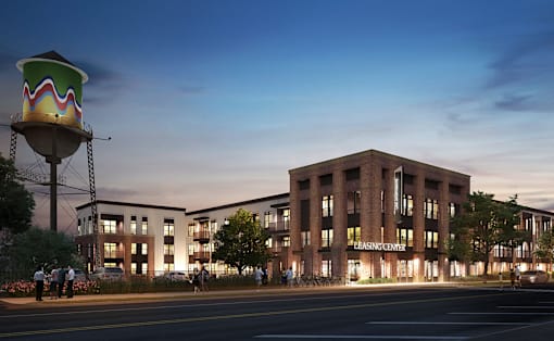 a rendering of a brick building with a water tower at Link Apartments® Broad Ave, Memphis