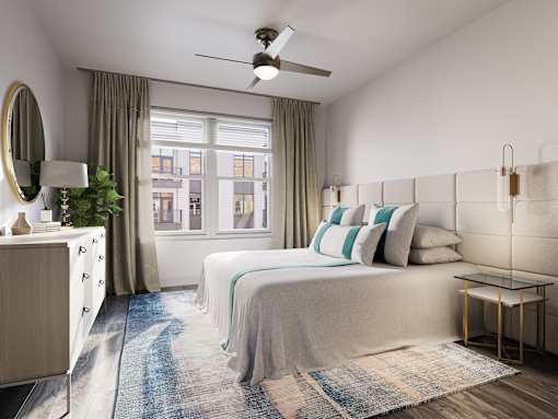 a bedroom with a bed and a window at Link Apartments® Broad Ave, Memphis, Tennessee