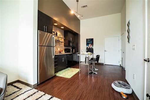 Stainless Steel & Black Appliances In The Kitchen at Link Apartments® Canvas, Atlanta, 30312