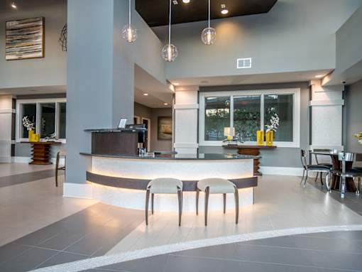 Eat-In Table With High Chairs In Clubhouse at Link Apartments® Glenwood South, Raleigh, NC, 27603