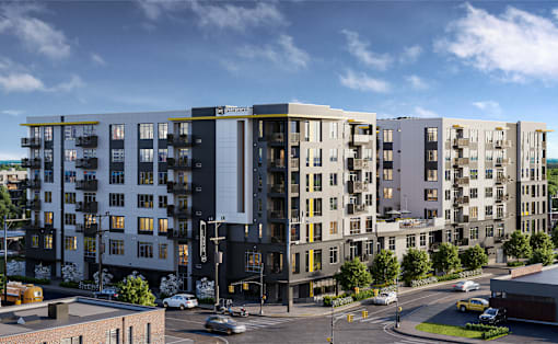 a rendering of an apartment building with a blue sky in the background at Link Apartments® Mint Street, Charlotte, NC, 28203
