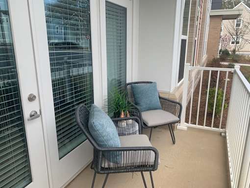 Large over size windows, comfy patio at Link Apartments® Mixson, South Carolina
