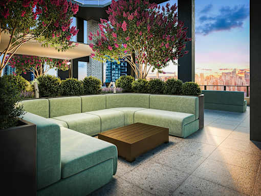 A modern outdoor seating area with a curved sofa and a wooden coffee table.